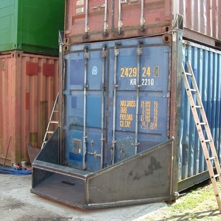 Attachment for unloading bulk goods from containers